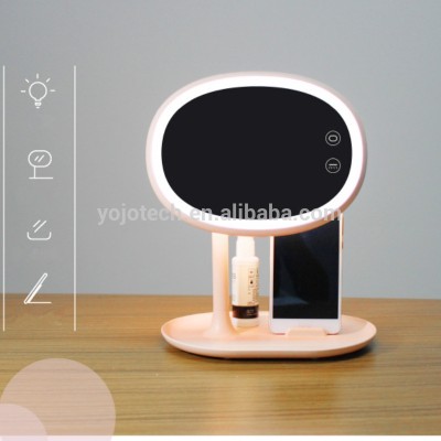 Folding LED makeup mirror and table lamp with mobile phone stand